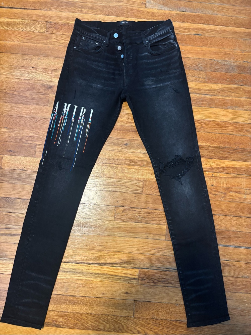 AMIRI Black Skinny Jeans with Drip Logo Accent